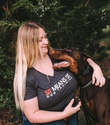 Doggy day training trainer and the dog she is training